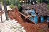 Huge compound wall collapses over house near Konaje